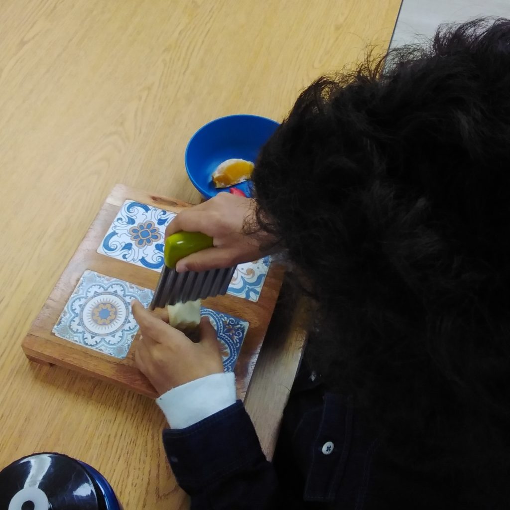 montessori style crinkle cutter Cutting a Banana Montessori Practical Life Activity